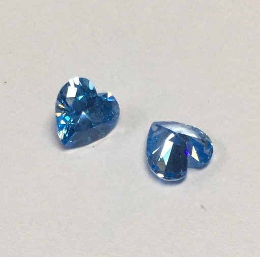 Commercio all'ingrosso di pietre preziose sintetiche con diamanti sciolti a forma di moissanite con taglio a cuore color blu VVS